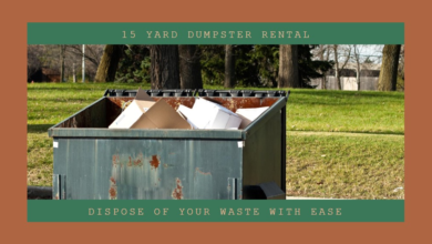 A 15-yard green dumpster filled with cardboard on a grassy field indicating rental services for easy waste disposal.